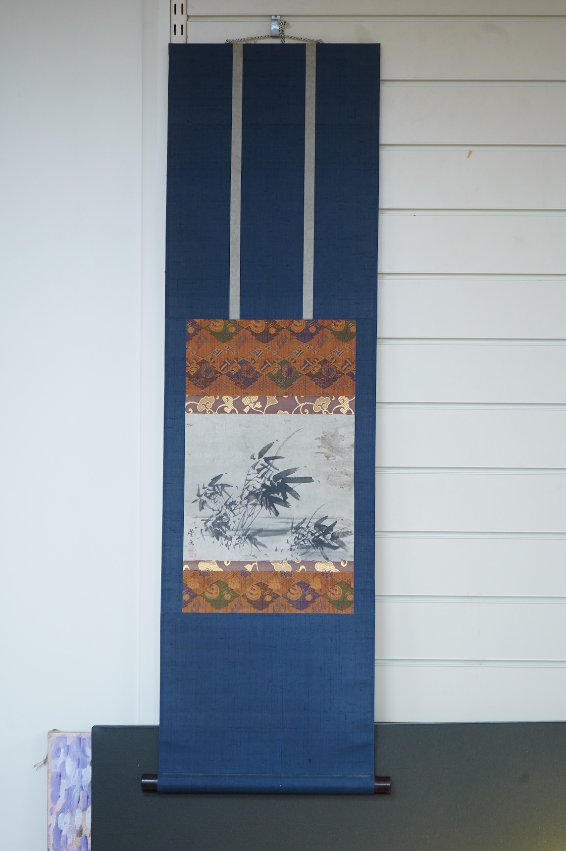 Four Japanese scrolls, to include a monochrome study of birds amongst lily pads, each boxed